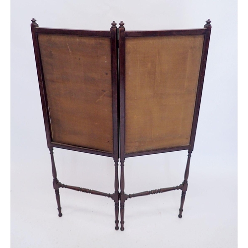 884 - A mahogany framed folding fire screen with spindle supports, 113cm tall