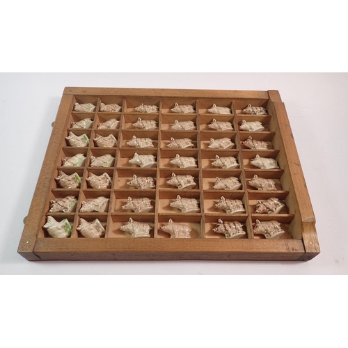 90 - A collection of 47 Wade Whimsie Wart Hogs in a printers tray