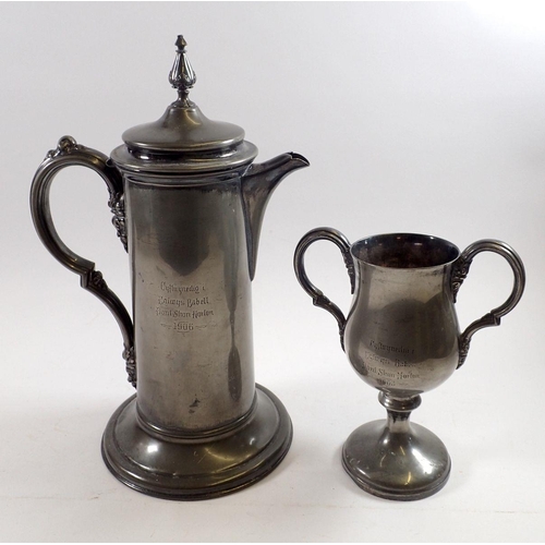 911 - An Edwardian Ashbury & Sons silver plated large flagon and trophy cup both engraved 'Cyftwynedig Egl... 