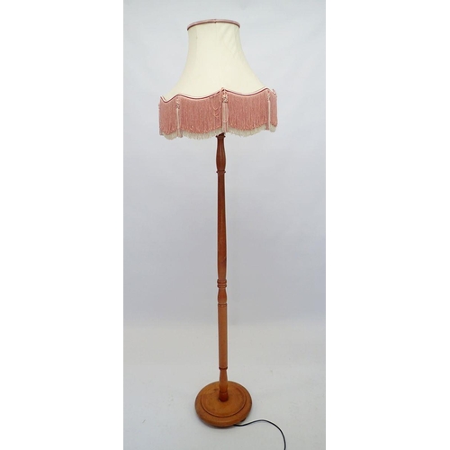 917 - A pine standard lamp, 150cm tall