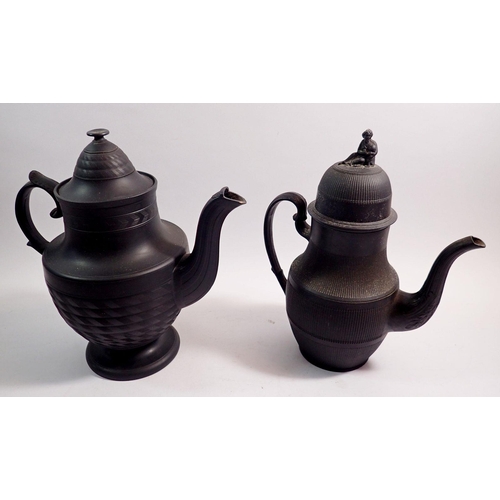 92 - A 19th century black basalt large tea pot and coffee pot with figurative finial, 26cm tall