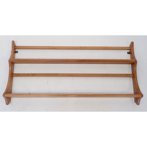 921 - An Ercol light elm plate rack, 96.5x49cm