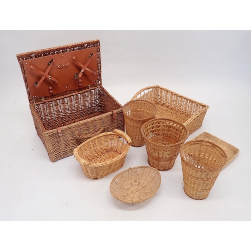 922 - A wicker hamper, a basket and other wicker ware