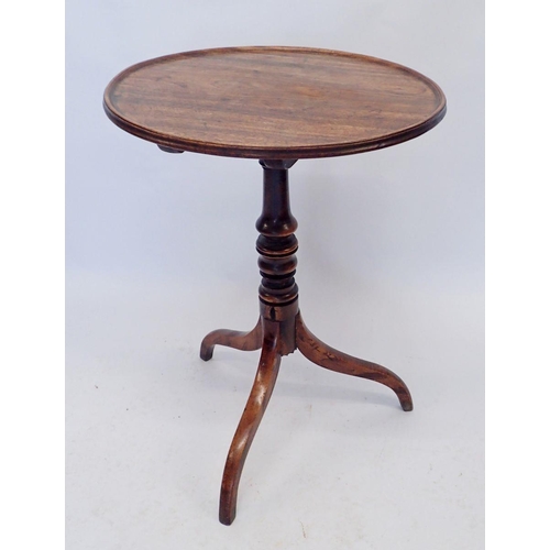 937 - A Georgian mahogany tilt top occasional table on down turned supports, 53cm diameter