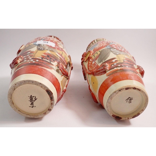 94 - A pair of Japanese late satsuma vases, 32cm