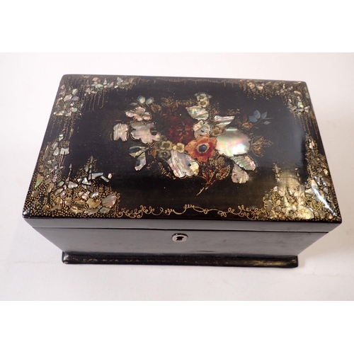 944 - A Victorian lacquer and mother of pearl tea caddy with floral decoration, fitted two lidded caddies ... 