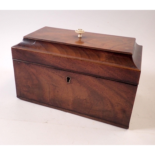 945 - A George III mahogany tea caddy with bone finial and three interior caddies, 24cm wide