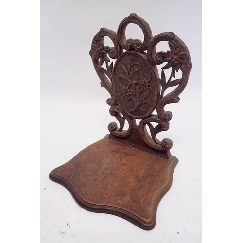 948 - A 19th century Black Forest Eidelwiss carved child's chair seat and back lacking legs, 33 x 23cm