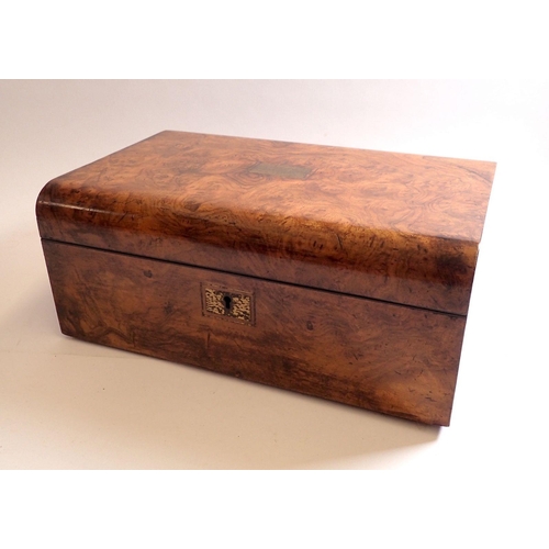 949 - A Victorian burr walnut writing slope with fitted interior and two inkwells, 35.5cm wide