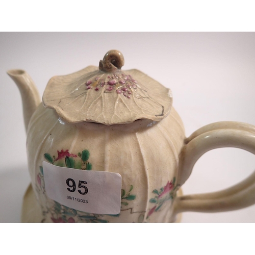 95 - A Japanese teapot, two cups and saucers and milk jug