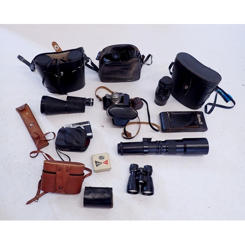 955 - A box of various cameras, binoculars, minocular, lenses etc. including a Fujica half camera, Brownie... 