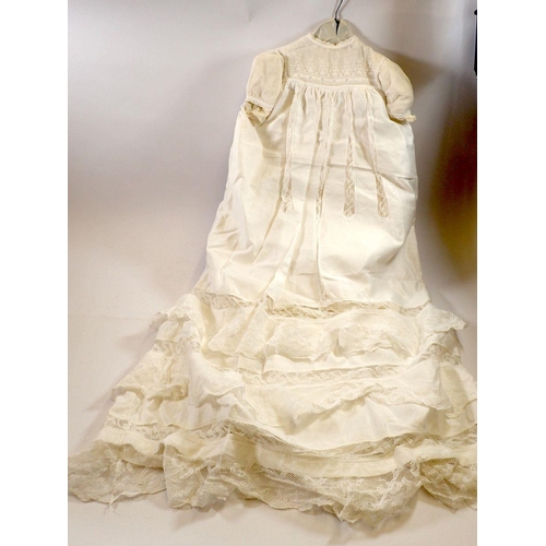 978 - A silk christening gown with inset lace panels