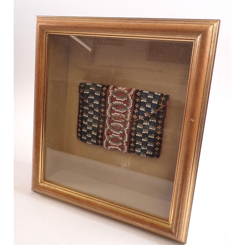 980 - A hand crafted beaded purse in antique style, framed 23.5 x 21 x 7cm