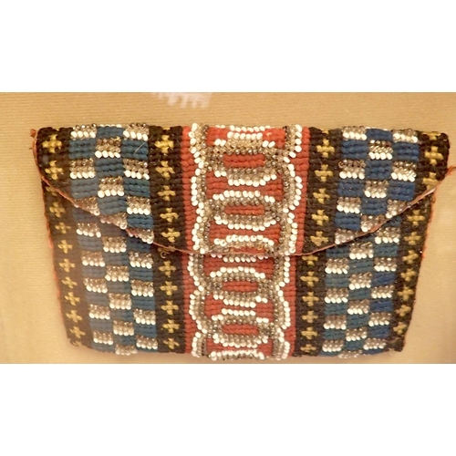 980 - A hand crafted beaded purse in antique style, framed 23.5 x 21 x 7cm