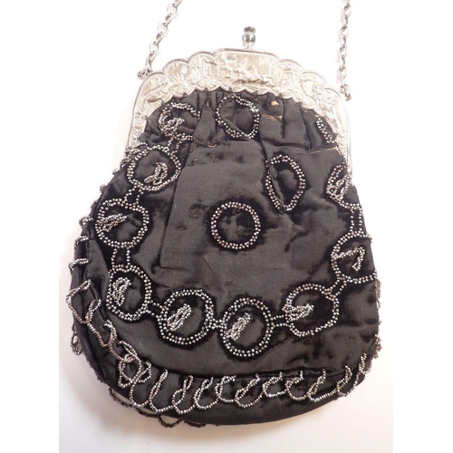 981 - A Victorian evening bag with silver plated clasp decorated horse racing scenes and jockeys