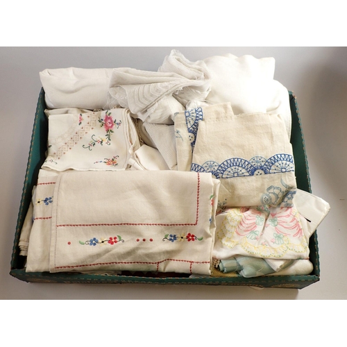 989 - A box of vintage table linen including some good embroidered table clothes etc.