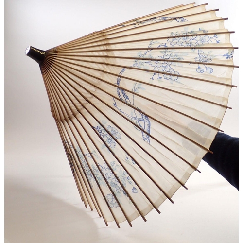 992 - A Japanese bamboo and silk parasol painted blue flowers, 86cm