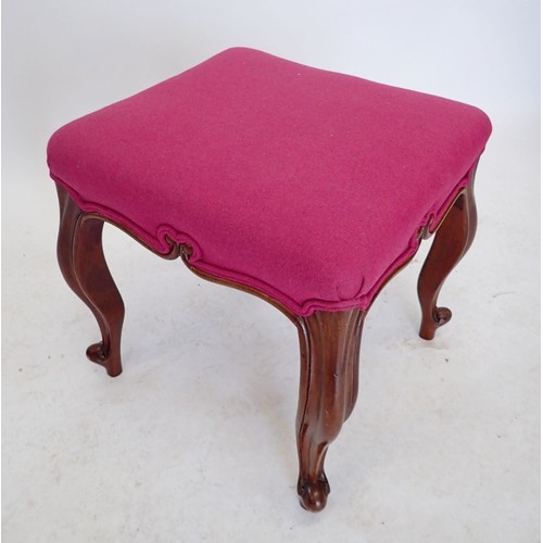 1134A - A Victorian mahogany stool on carved cabriole supports, upholstered in pink, seat 42 x 46cm