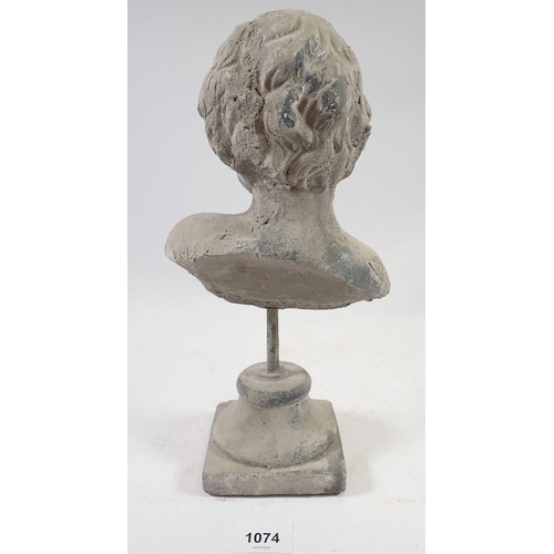 1074 - A child's bust ornament, 30cm