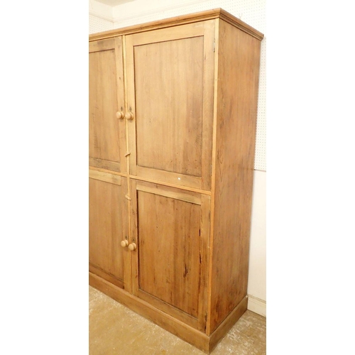 1081 - A Victorian large pine kitchen or housekeepers cupboard with two pairs of panelled doors, 158cm wide... 