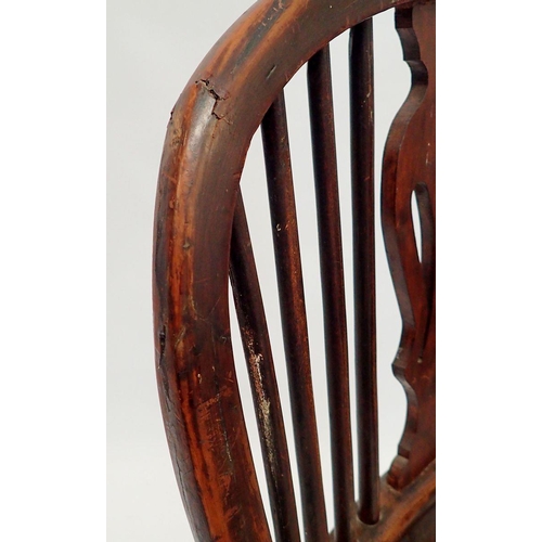 1088 - A late 19th century provincial Windsor chair in yew and elm