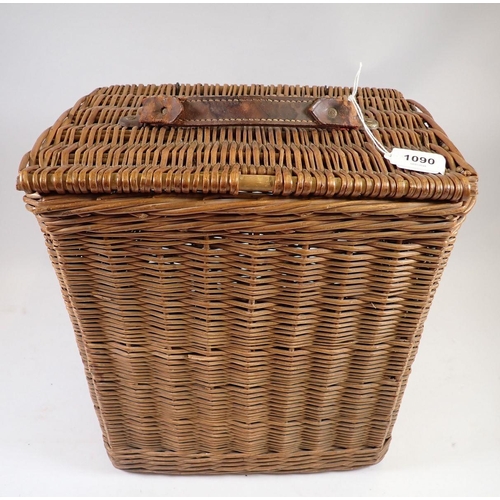 1090 - An early 20th century Coracle wicker wine carrier