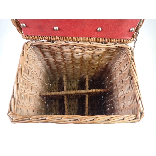 1090 - An early 20th century Coracle wicker wine carrier