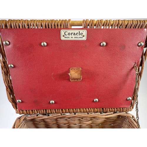 1090 - An early 20th century Coracle wicker wine carrier