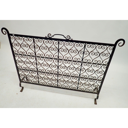 1094 - Two cast iron fire guards, 105cm wide