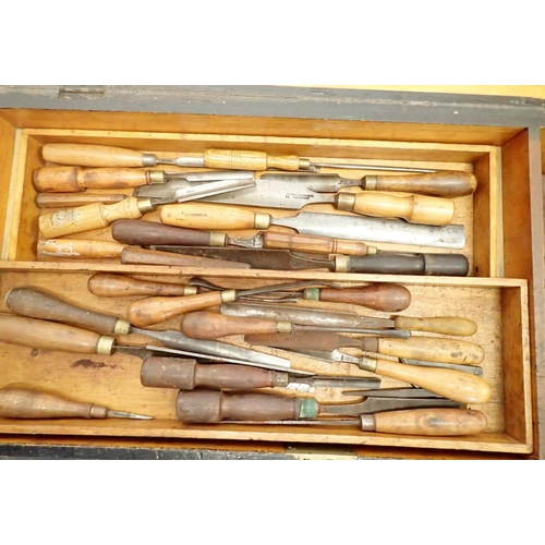 1098 - An antique carpenters chest with sliding trays and contents of woodworking tools including large sel... 