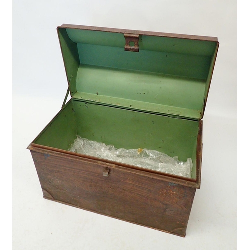 1105 - An old canted top tin trunk, by Kirk & Wilsons, 61cm wide