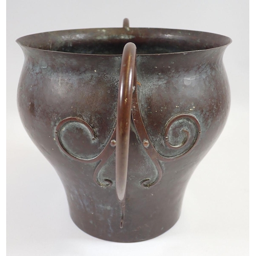 1136 - A Victorian beaten copper Arts & Crafts two handled planter, 18cm tall,