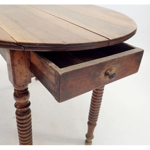 1215 - A French walnut dropleaf supper table with end drawer and turned supports, 72cm high