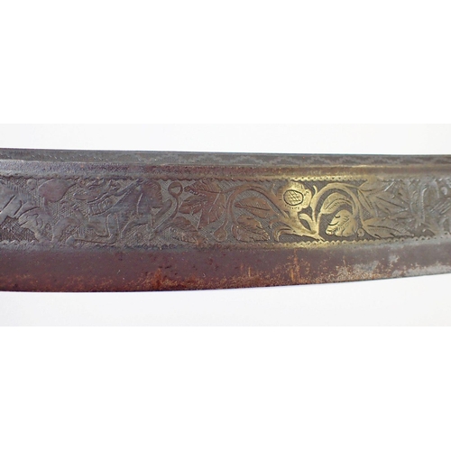 1233 - An antique Burmese sword or dha, the singe edge curved blade decorated animals, flowers and foliage ... 