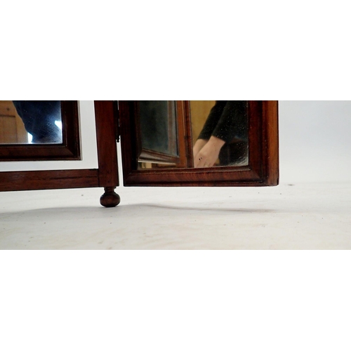 1240 - A walnut triple frame mirror with shell motif, 66cm tall, one foot missing