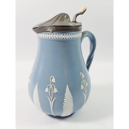 125 - A 19th century stoneware and pewter mounted press moulded jug with lid decorated ferns and harebells