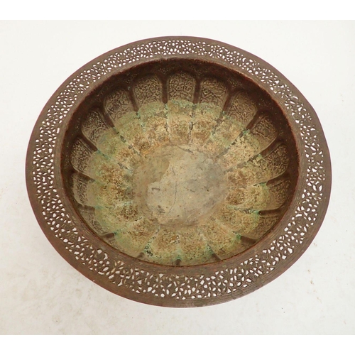 1252 - A large Indian copper brazier bowl with pierced rim and cast floral decoration, 40.5cm diameter