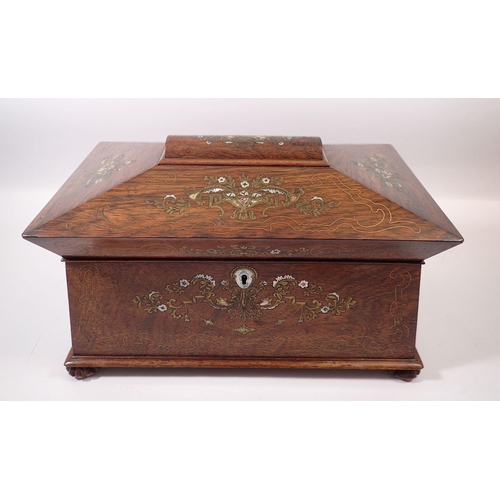 1257 - A 19th century fine rosewood sarcophagus form tea caddy with brass and mother of pearl inlay, fitted... 