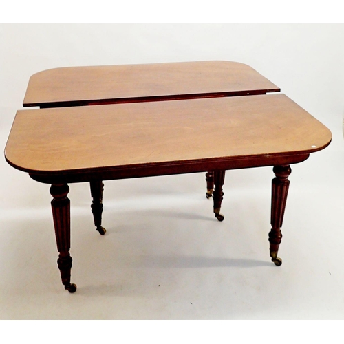 1260 - A Victorian Gillow's Style  large mahogany dining table with three extending leaves, and slide out m... 