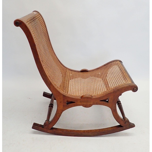 1264 - A 19th century cane seated rocking chair