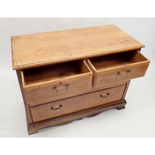 1309 - A late 19th century oak chest of two short and two long drawers, 108 x 49 x 82cm