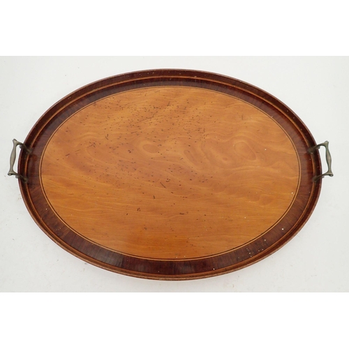 1311 - An Edwardian mahogany oval tray 65cm wide