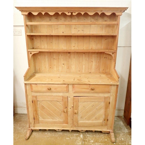 1316 - A small 19th century pine dresser with three tier back over two drawers and two panelled cupboards, ... 