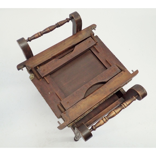 1328 - An Edwardian piano stool with unusual seat rising mechanism with sheet music storage