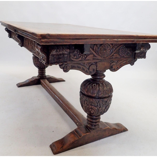 1332 - An oak Elizabethan style drawleaf refectory table on large carved cup and cover supports, 151 x 86cm... 