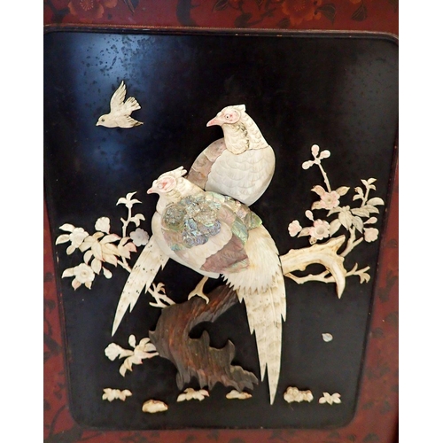 1333 - A Japanese lacquer fire screen decorated pheasants and flowers in bone and mother of pearl, 86 x 75.... 