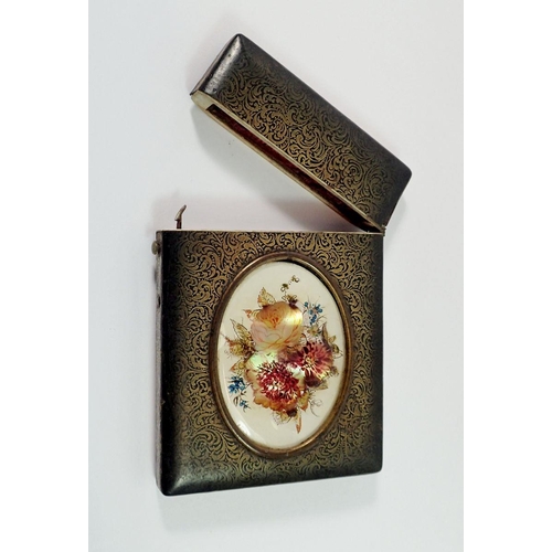 1343 - A 19th century lacquered bone card case inset oval mother of pearl floral painted panel