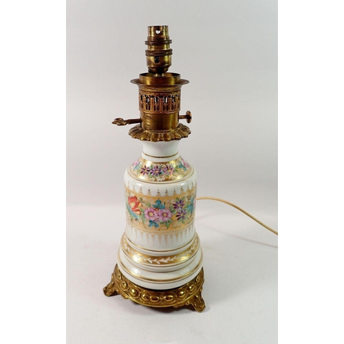 139 - A Victorian floral painted porcelain oil lamp with gilt metal mounts, converted to a table lamp tota... 