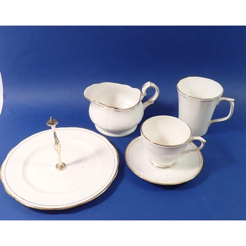 150 - A Duchess gilt and white tea, coffee and dinner service comprising six tea cups and saucers, six cof... 