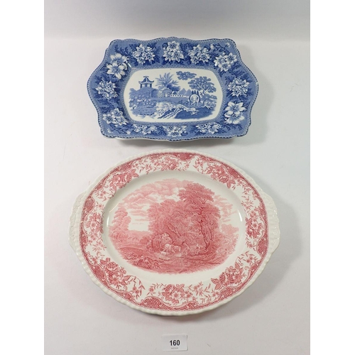 160 - A blue and white meat plate 38cm and a puce printed one